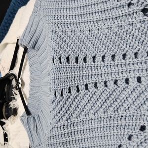 Robins egg blue sweater, heavier type.